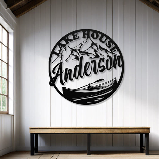 Decorative wall art with 'Lake House Anderson' text in a room with wooden floor and window.
